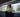 Person using phone while waiting for train